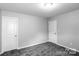 The bedroom features carpeted floors and is well-lit with neutral paint at 11109 Pond Valley Ct, Charlotte, NC 28269