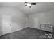 Serene bedroom with plush carpet and ample closet space at 11109 Pond Valley Ct, Charlotte, NC 28269