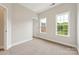 Bedroom with views and featuring neutral walls and carpet at 1126 Dean Hall Ln, Matthews, NC 28105