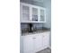 Elegant dining area featuring white cabinets and granite countertops with a convenient coffee bar at 1184 Sherwood Rd, Clover, SC 29710