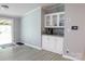 Stylish dining area featuring modern cabinetry, granite countertops, and easy access to the deck at 1184 Sherwood Rd, Clover, SC 29710