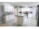 Spacious kitchen boasts stainless steel appliances, granite countertops, a center island, and ample cabinet space at 1184 Sherwood Rd, Clover, SC 29710