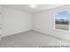 Inviting bedroom with neutral carpet and large window showcasing scenic views at 125 Tangle River Dr # 51, Statesville, NC 28677