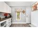 Cozy dining area features built-in cabinets, wood countertop, and natural light at 12504 Culp Rd, Gold Hill, NC 28071