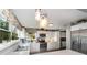 Bright kitchen features white cabinets, stainless steel appliances, modern countertops, and ample natural light at 12504 Culp Rd, Gold Hill, NC 28071
