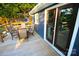 A cozy back porch with comfortable seating and scenic views of the outdoors at 132 Marina Ln, Mooresville, NC 28117