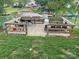Outdoor seating area at dock with benches and table overlooking boats and lake at 132 Marina Ln, Mooresville, NC 28117