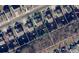 Aerial view of lot in established neighborhood with mature trees and convenient location at 14413 Lake Crossing Dr, Charlotte, NC 28278
