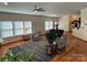 Open living room area with lots of light and comfortable seating at 14413 Lake Crossing Dr, Charlotte, NC 28278