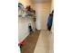 Practical mudroom features shelving for storage and organization at 14413 Lake Crossing Dr, Charlotte, NC 28278