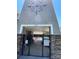 Gated community pool entrance featuring stone accents and clear signage for pool rules at 14413 Lake Crossing Dr, Charlotte, NC 28278