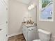 Bright half-bathroom with stylish vanity, granite countertop, and modern fixtures at 1645 Carolina Cir, Gastonia, NC 28054