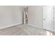 Neutral bedroom featuring soft carpeting with a view through an open door, and a double closet at 1645 Carolina Cir, Gastonia, NC 28054