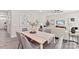 Elegant dining room with modern decor, seamlessly connected to the living room at 1645 Carolina Cir, Gastonia, NC 28054
