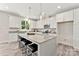 Spacious kitchen featuring a granite island with seating and stainless steel appliances at 1645 Carolina Cir, Gastonia, NC 28054