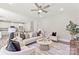 Cozy living room with modern decor, a comfortable sofa, and open to the dining area at 1645 Carolina Cir, Gastonia, NC 28054