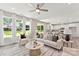 Bright and airy living room with a comfortable seating arrangement and an open layout to the kitchen at 1645 Carolina Cir, Gastonia, NC 28054