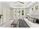Spacious main bedroom with tray ceiling, recessed lighting, and natural light streaming through multiple windows at 1645 Carolina Cir, Gastonia, NC 28054