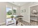 Bright and airy home office with a modern desk, stylish chair, and ample natural light at 1645 Carolina Cir, Gastonia, NC 28054