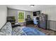 Comfortable bedroom with hardwood floors, a window, and a cozy seating area at 1730 Woodbend Ln, Conover, NC 28613