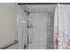 Updated bathroom featuring a shower with tiled walls and a glass shower door at 1730 Woodbend Ln, Conover, NC 28613