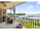Balcony with lake views featuring outdoor seating, flowers and potted plants, ideal for relaxing at 20417 Harborgate Ct # 510, Cornelius, NC 28031