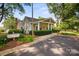 Charming clubhouse featuring well-kept landscaping and covered porch for resident's enjoyment at 20417 Harborgate Ct # 510, Cornelius, NC 28031