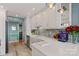 Beautiful kitchen featuring white cabinets, stylish backsplash, and stainless steel appliances at 20417 Harborgate Ct # 510, Cornelius, NC 28031
