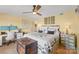 Bright main bedroom features a ceiling fan, desk and ensuite bath at 20417 Harborgate Ct # 510, Cornelius, NC 28031