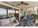 Inviting screened porch with comfortable seating and serene water views, perfect for outdoor enjoyment at 20417 Harborgate Ct # 510, Cornelius, NC 28031