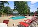 Inviting community pool with lounge chairs, perfect for relaxing and enjoying the sunshine at 20417 Harborgate Ct # 510, Cornelius, NC 28031