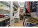 Organized walk-in closet with custom shelving, hanging rods and recessed lighting for optimal storage at 20417 Harborgate Ct # 510, Cornelius, NC 28031