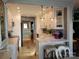 Bright kitchen featuring white cabinetry, a breakfast bar, and stylish pendant lighting at 20417 Harborgate Ct # 510, Cornelius, NC 28031