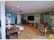 Spacious living room showcasing hardwood floors, ample seating, and modern decor at 20417 Harborgate Ct # 510, Cornelius, NC 28031