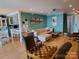 Open-concept living room with a view into the kitchen, showcasing stylish furnishings at 20417 Harborgate Ct # 510, Cornelius, NC 28031