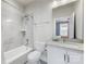 Bright bathroom features a shower-tub combo and a spacious vanity with a large mirror at 2108 Bryant Park Dr, Charlotte, NC 28208