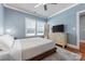 Comfortable bedroom with ample natural light, a dresser, and a mirror at 2108 Bryant Park Dr, Charlotte, NC 28208