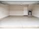 Clean and spacious garage with epoxy flooring, ample room for parking and storage at 2108 Bryant Park Dr, Charlotte, NC 28208