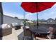Entertain on the private terrace featuring comfortable seating, an umbrella, and stunning city views at 2108 Bryant Park Dr, Charlotte, NC 28208