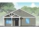 Charming single-story home with gray siding, white trim, a covered porch, and a well-manicured lawn at 2116A Glenwood St, Kannapolis, NC 28083