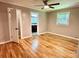 A bedroom with hardwood floors, a ceiling fan, and natural light at 2130 Vashti Rd, Taylorsville, NC 28681