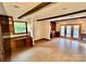 Bonus room featuring wooden beams, cabinetry, tile flooring, and French doors at 2130 Vashti Rd, Taylorsville, NC 28681