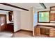 Bonus room with tile floor, wooden beams, cabinetry, and natural light at 2130 Vashti Rd, Taylorsville, NC 28681