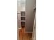 Walk in closet with hardwood floor and white shelving at 2130 Vashti Rd, Taylorsville, NC 28681