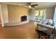 Spacious living room featuring a unique brick fireplace, neutral walls, and access to the backyard at 2130 Vashti Rd, Taylorsville, NC 28681