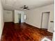 Spacious living room featuring hardwood floors, a ceiling fan, and white walls at 2130 Vashti Rd, Taylorsville, NC 28681