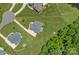 Captivating aerial shot of homes with huge backyard lawns and mature trees at 224 Hidden Meadows Dr, Mooresville, NC 28117