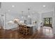 Spacious kitchen with a central island and stainless appliances next to the front entrance at 224 Hidden Meadows Dr, Mooresville, NC 28117