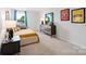 Cozy bedroom featuring a daybed, neutral colors, and a large window at 3064 Ora Smith Rd, Lincolnton, NC 28092