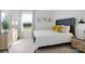 Bright bedroom featuring large window, stylish decor, and contemporary furnishings at 3064 Ora Smith Rd, Lincolnton, NC 28092